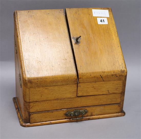 An oak stationery box height 30cm